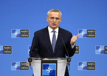 NATO chief reiterates support for Ukraine in a surprise visit to Kyiv